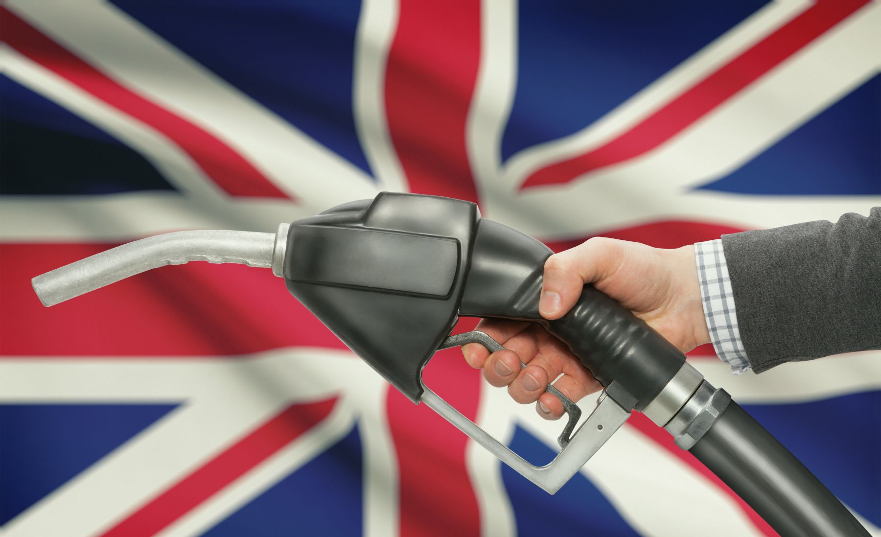 Fuel nozzle with British flag in background